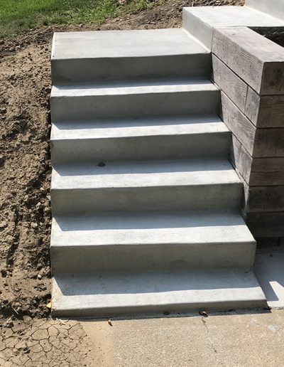 concrete steps and retaining wall