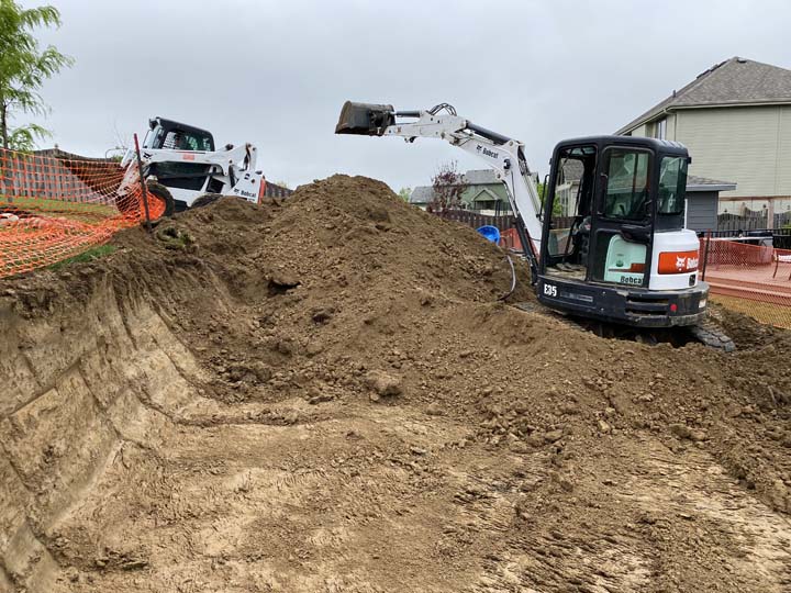 Retaining wall dirt work