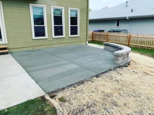 cement patio with curved wall